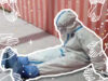 This Photo of A Guwahati Nurse In PPE Suit Sitting Exhausted Speaks Volumes! We Salute Her Dedication