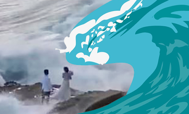 FI Wedding Couple Swept Off Their Feet By A Giant Wave