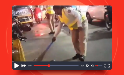 Fl-Woman-Police-Constable-Sweeps-Road-to-Remove-Broken-Glass-pieces