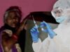 Elderly Woman Hides Behind A Drum Because She Fears The COVID 19 Vaccine