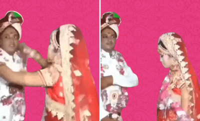 Bride-&-Groom-Angrily-Throw-Garlands-at-Each-Other-During-Wedding-Ceremony