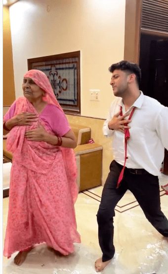 Grandmother dancing with grandson