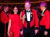 Meghan Markle Made Red Carpet Comeback Wearing A Gorgeous Red Gown With A Plunging Neckline And High Slit