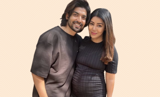 Gurmeet Choudhary And Debina Bonnerjee Share A Pic To Announce Their Pregnancy. Debina Flaunts Her Baby Bump In A Short Black Dress