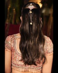 Isha Ambani Dazzles In Traditional Tarun Tahiliani Lehenga With Ruby Hair Pin Featuring a Dancing Girl!