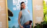 Anne Hathaway Shuts Down Fake Baby Bump Claims With A Witty Response. We Love An Unbothered Queen!